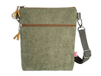 Green textured crossbody bag with a strap on a white background