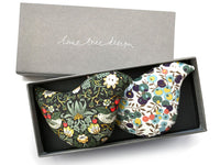 2 lavender bags in the shape of birds in Liberty print fabrics in a grey box