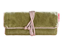 An olive green velvet jewellery roll with a light pink trim and matching pink tie closure, shown against a plain white background.