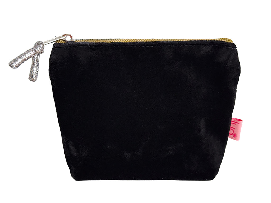 A black velvet purse with a zip and a silver toggle pull, shown on a plain white background.