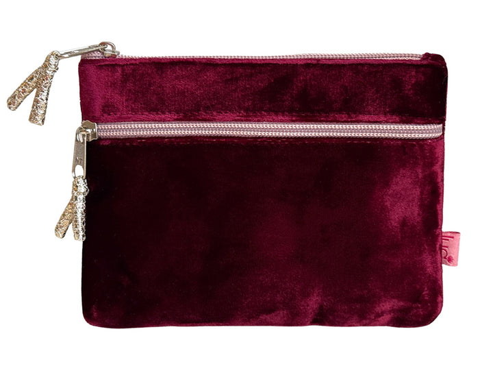 A deep burgundy velvet pouch with two silver-toned zippers and decorative silver zipper pulls, shown against a plain white background.