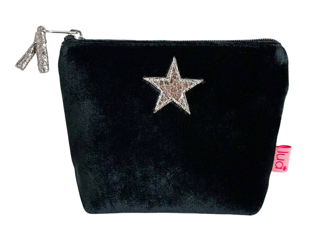 Black velvet purse with a metallic appliquéd star on a white background