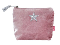 A dusty pink velvet zippered pouch featuring a glittery silver star applique on the front and a silver zipper pull with a tassel, shown against a plain white background.