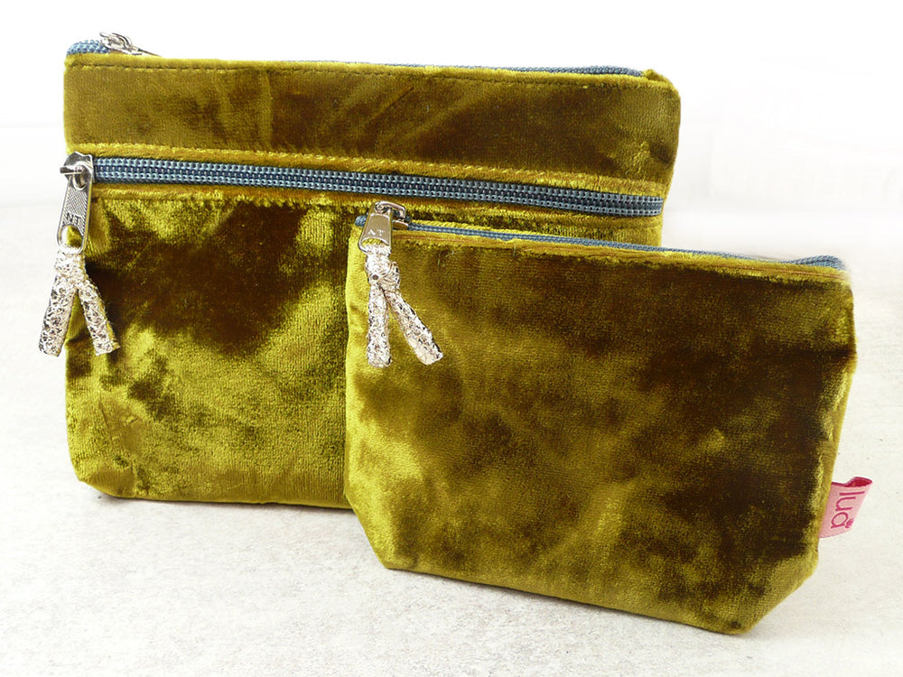 2 velvet purses of different sizes on a white background