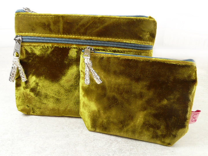 2 velvet purses of different sizes on a white background