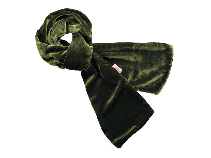 An olive green velvet scarf, styled in a loose knot, displayed against a solid white background.